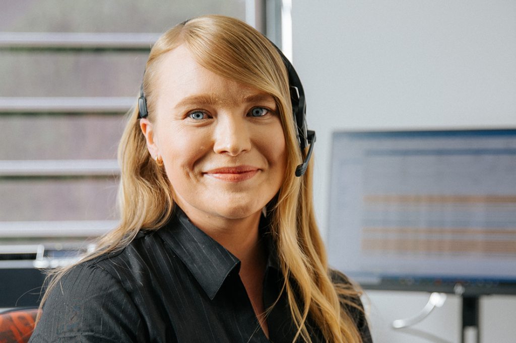 Smiling women with headphones